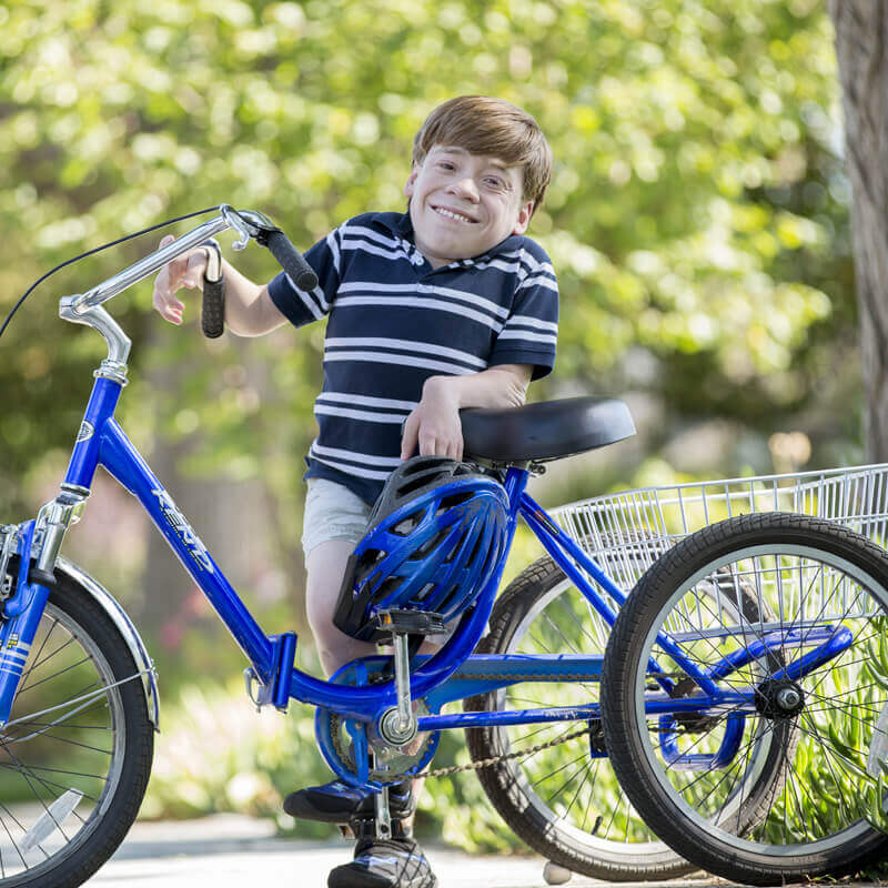 Boy with blue bike